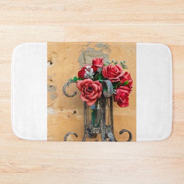 Item preview, Red Rose Bouquet in Rustic Metal Wall Sconce Against Textured Orange Plaster Wall designed and sold by Nmallia.