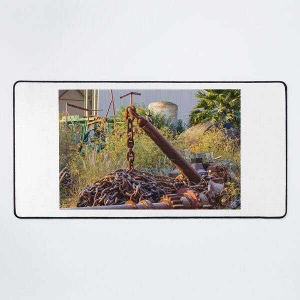 Item preview, Rusted Anchor and Heavy Chain Amid Overgrown Industrial Scrapyard With Machinery and Plants designed and sold by Nmallia.