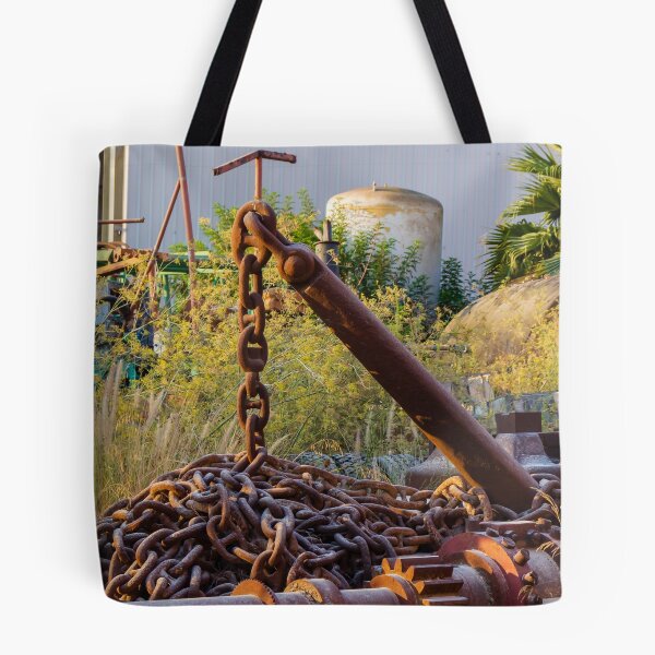 Item preview, Rusted Anchor and Heavy Chain Amid Overgrown Industrial Scrapyard With Machinery and Plants designed and sold by Nmallia.