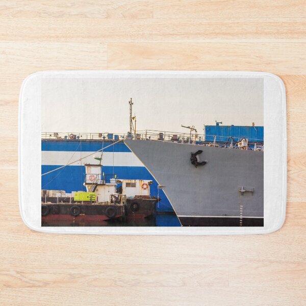 Item preview, Gray Ship Bow Docked at Harbor With Calm Water Reflection and Industrial Port Details designed and sold by Nmallia.