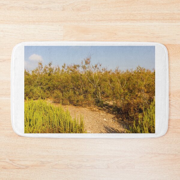 Item preview, Dry Coastal Shrubland With Sandy Path and Golden Shrubs in Summer Light designed and sold by Nmallia.