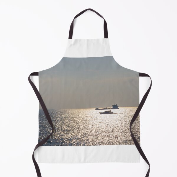 Item preview, Sunlit Ocean Horizon With Silhouetted Cargo Ship And Motorboat Crossing Glittering Water designed and sold by Nmallia.