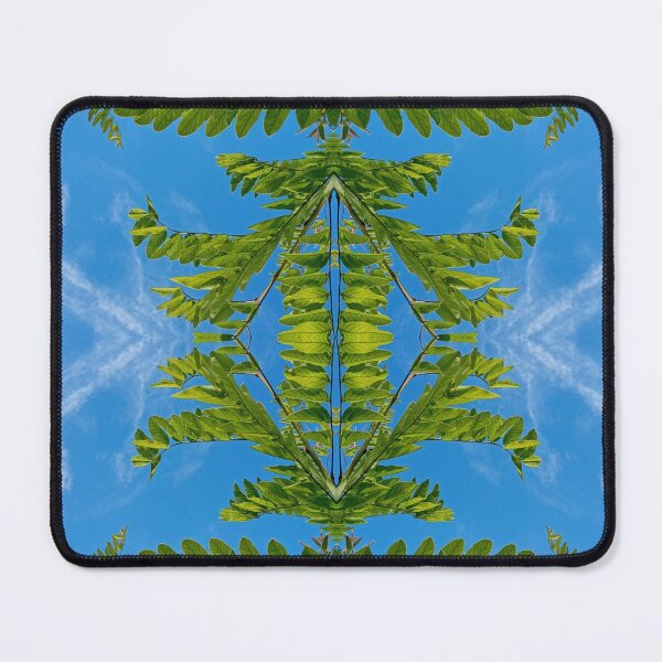 Item preview, Branch of green leaves against a blue sky, mirror image designed and sold by lyloubeaupere.
