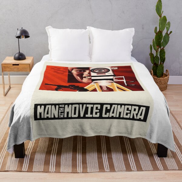 Item preview, Man with a Movie Camera – Vintage Retro Filmmaker Poster designed and sold by halah bue.