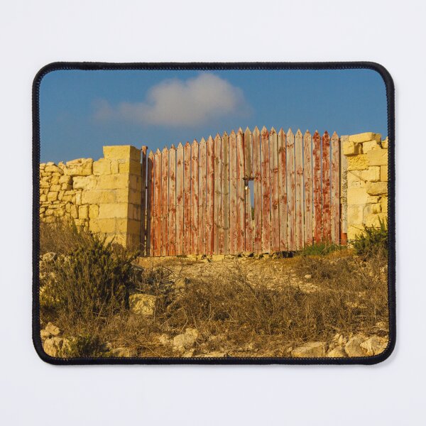 Item preview, Rustic Red Wooden Gate Set in Sunlit Stone Wall on a Dry Mediterranean Countryside designed and sold by Nmallia.