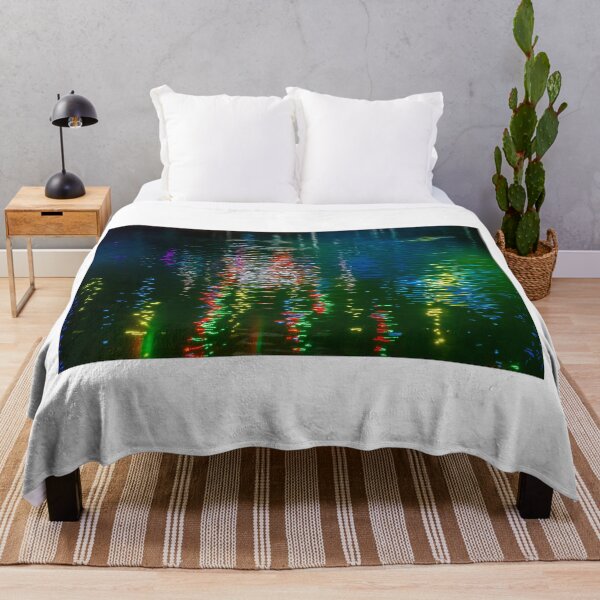 Item preview, Colorful Night Lights Reflected on Rippling Water Surface for Abstract Urban Mood designed and sold by Nmallia.