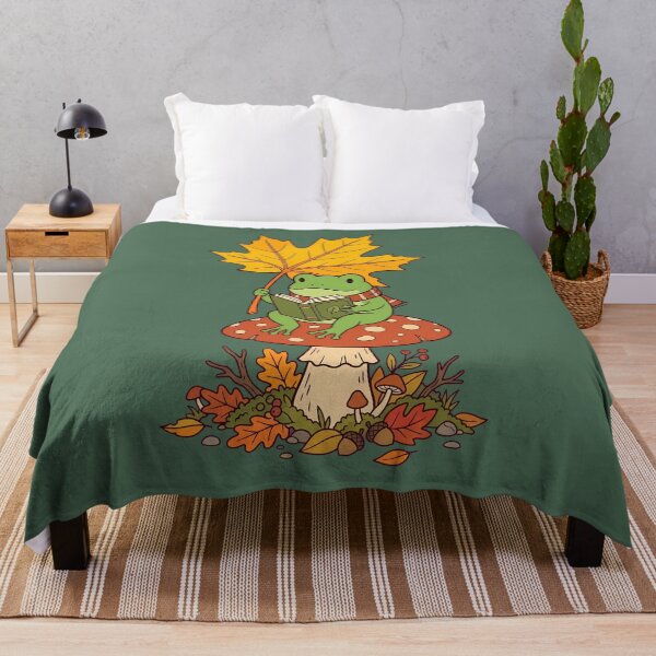 Item preview, Cozy Frog Reading Under Autumn Leaf designed and sold by DripCultureLab.