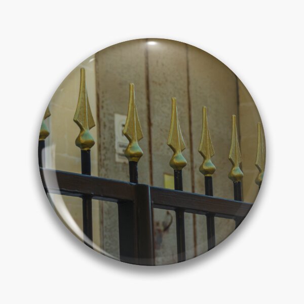 Item preview, Metal Fence With Gold Spiked Finials Along Building Exterior designed and sold by Nmallia.