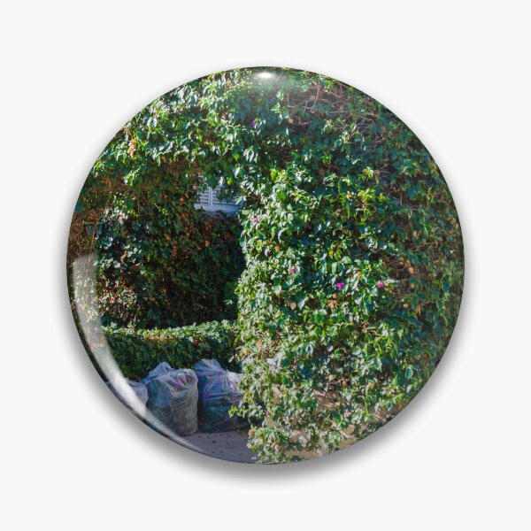 Item preview, Overgrown Ivy Arch Forms a Secluded Green Entrance Beside Trash Bags designed and sold by Nmallia.