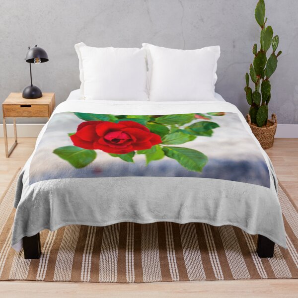 Item preview, Vibrant Red Rose in Focus With Buds and Lush Green Foliage in Garden Setting designed and sold by Nmallia.