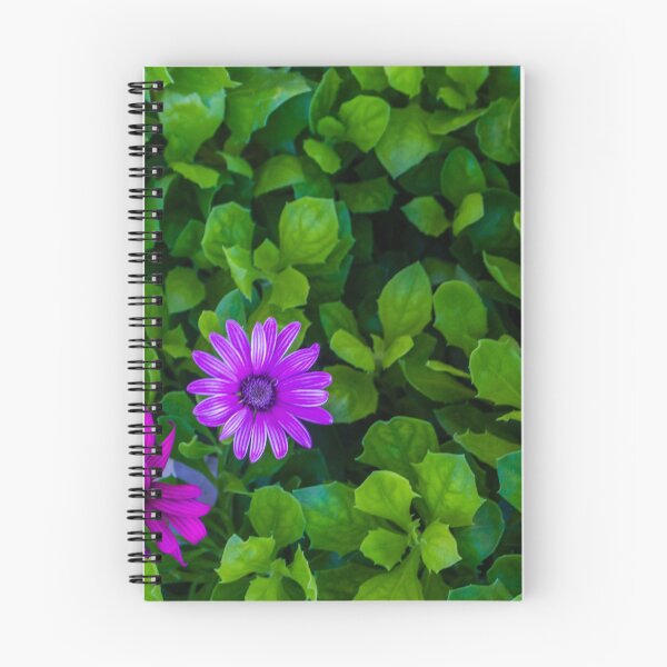 Item preview, Vibrant Purple Flowers Among Lush Green Leaves in a Bright Garden Scene designed and sold by Nmallia.
