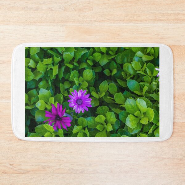 Item preview, Vibrant Purple Flowers Among Lush Green Leaves in a Bright Garden Scene designed and sold by Nmallia.