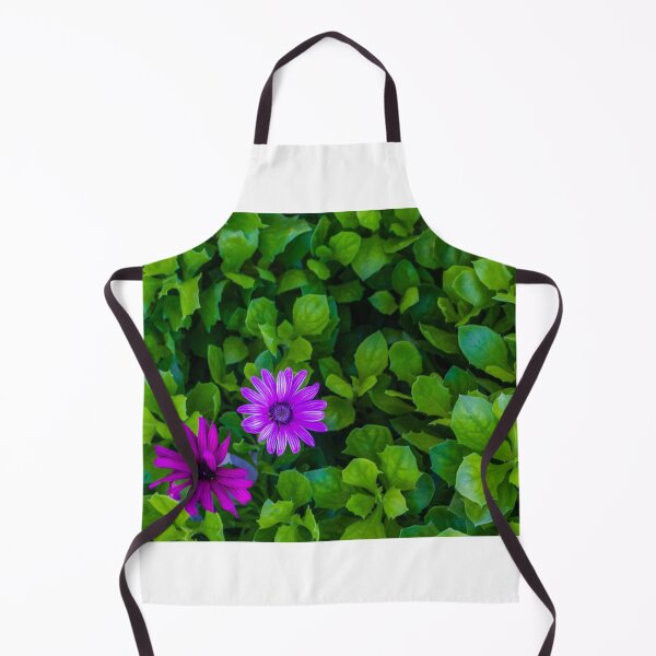 Item preview, Vibrant Purple Flowers Among Lush Green Leaves in a Bright Garden Scene designed and sold by Nmallia.