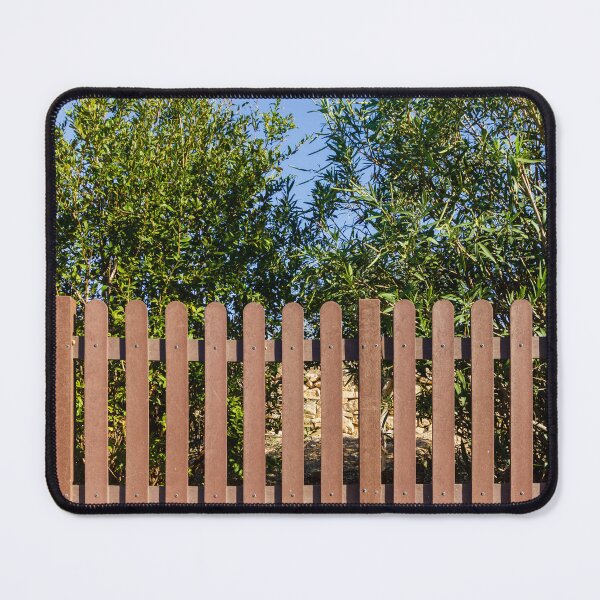 Item preview, Brown Wooden Picket Fence With Lush Greenery Behind In Sunny Outdoor Yard Near Olive Trees designed and sold by Nmallia.