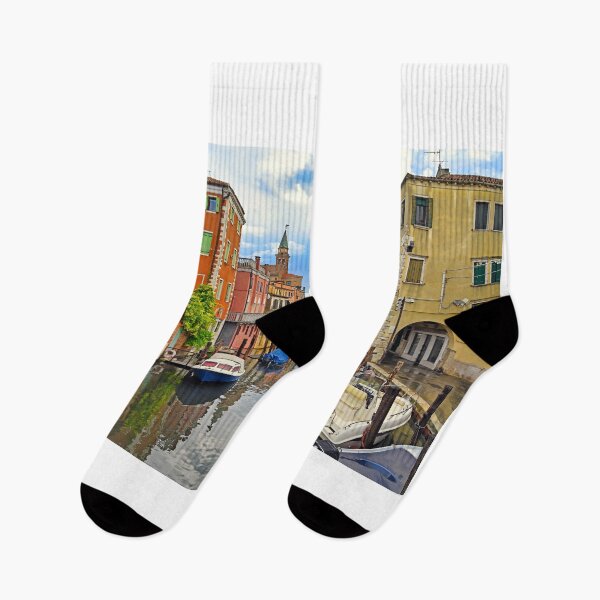 Item preview, Vena Canal with colorful houses and arched porticos in Chioggia, Italy designed and sold by goceris.
