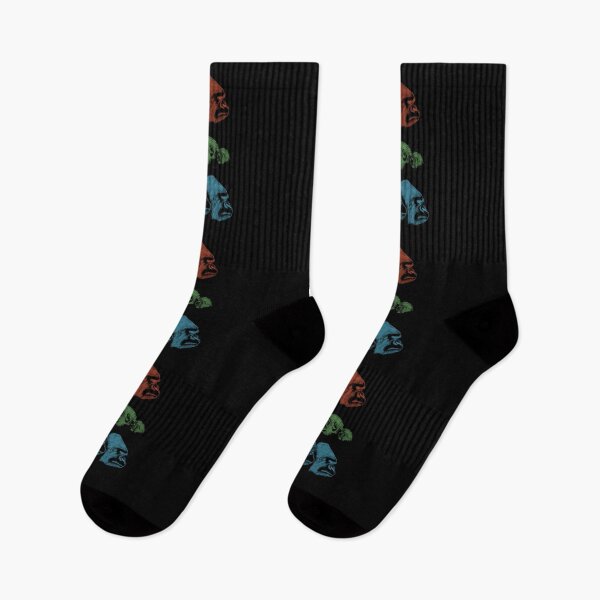 Item preview, Group of four different monkeys facing the same side in red, green and blue designed and sold by Sock Garden.