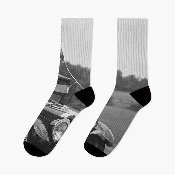 Item preview, Vintage Golfer Teeing Off on Top of a Car designed and sold by ColemanOlmos.