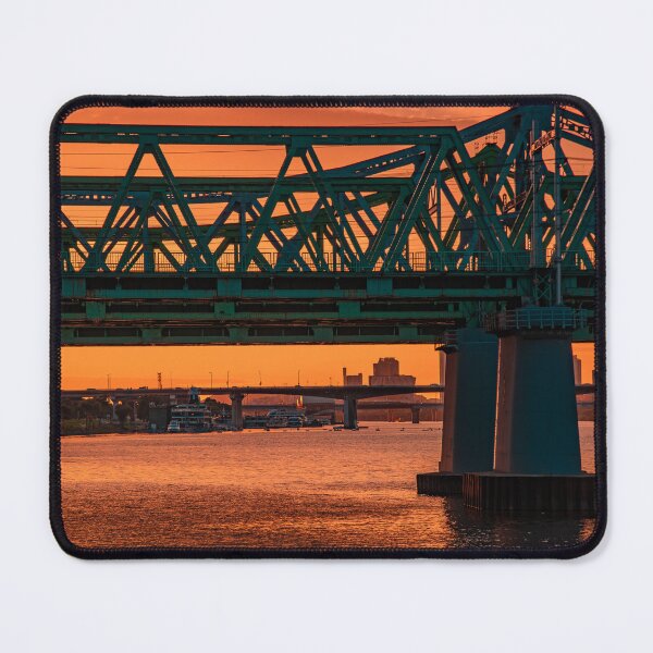 Item preview, Truss Bridge Silhouette Over Golden Sunset River designed and sold by Nightwindow.