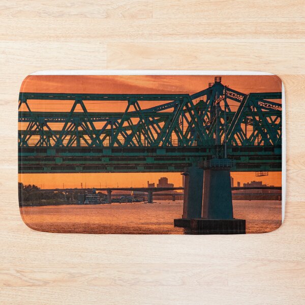 Item preview, Truss Bridge Silhouette Over Golden Sunset River designed and sold by Nightwindow.