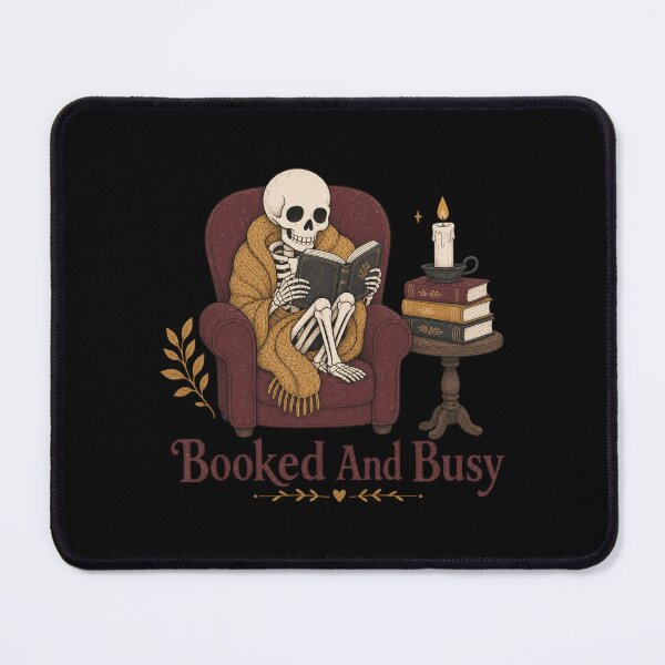 Item preview, Booked And Busy Shirt, Comfort Colors® Skeleton Reading Tee, Funny Halloween Book Lover Graphic designed and sold by TshirtsLabs.