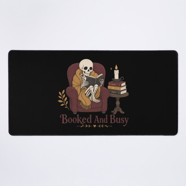 Item preview, Booked And Busy Shirt, Comfort Colors® Skeleton Reading Tee, Funny Halloween Book Lover Graphic designed and sold by TshirtsLabs.
