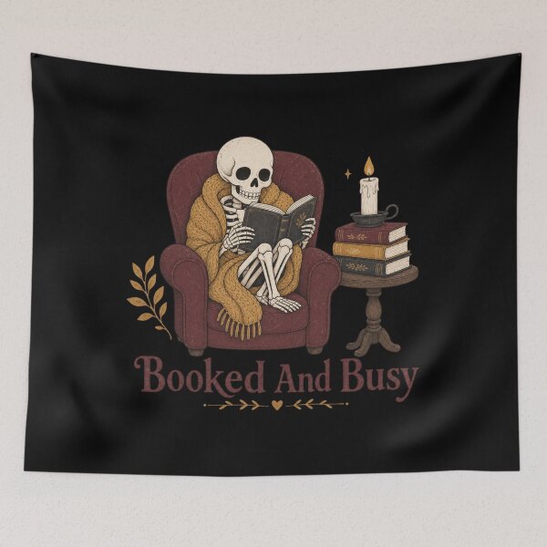 Item preview, Booked And Busy Shirt, Comfort Colors® Skeleton Reading Tee, Funny Halloween Book Lover Graphic designed and sold by TshirtsLabs.