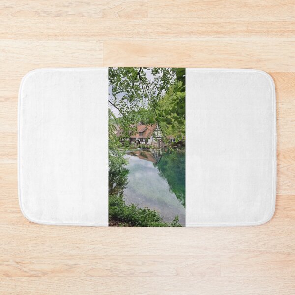 Item preview, Blautopf Blaubeuren Sensic German Watemill Nature Landsccape designed and sold by EmberEchoArt.