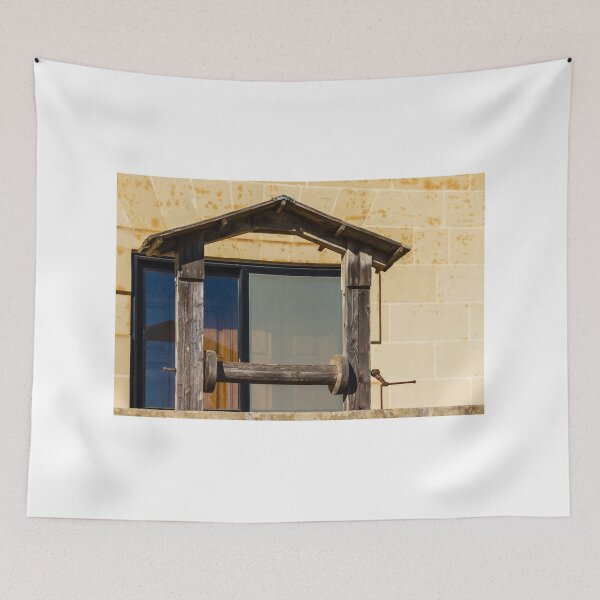 Item preview, Rustic Wooden Frame With Crossbar Over Glass Window On Pale Stone Wall Building designed and sold by Nmallia.