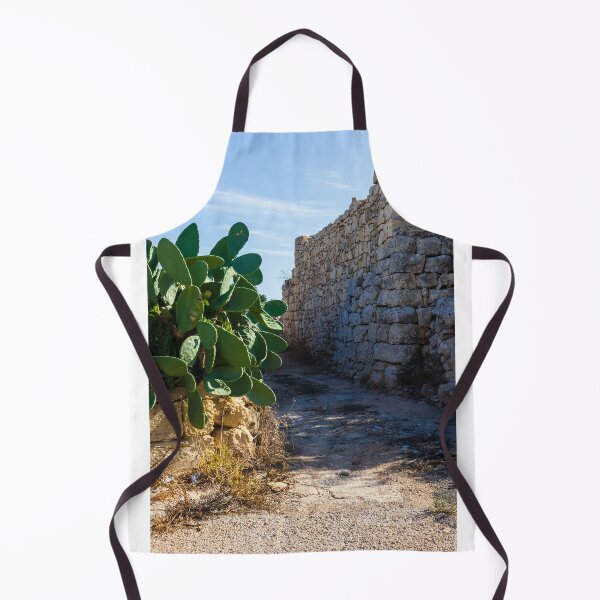 Item preview, Ancient Stone Wall Along a Desert Path with Cactus Plants Under Clear Sky designed and sold by Nmallia.