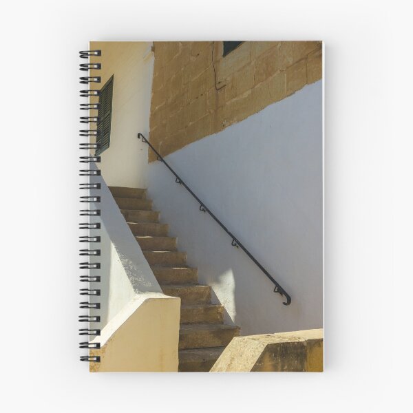 Item preview, Sunlit Stone Staircase With Black Handrail Along White And Beige Walls designed and sold by Nmallia.