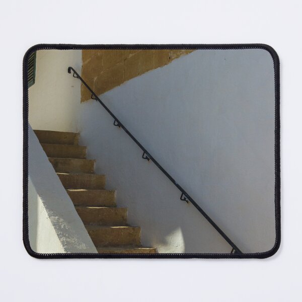 Item preview, Sunlit Stone Staircase With Black Handrail Along White And Beige Walls designed and sold by Nmallia.