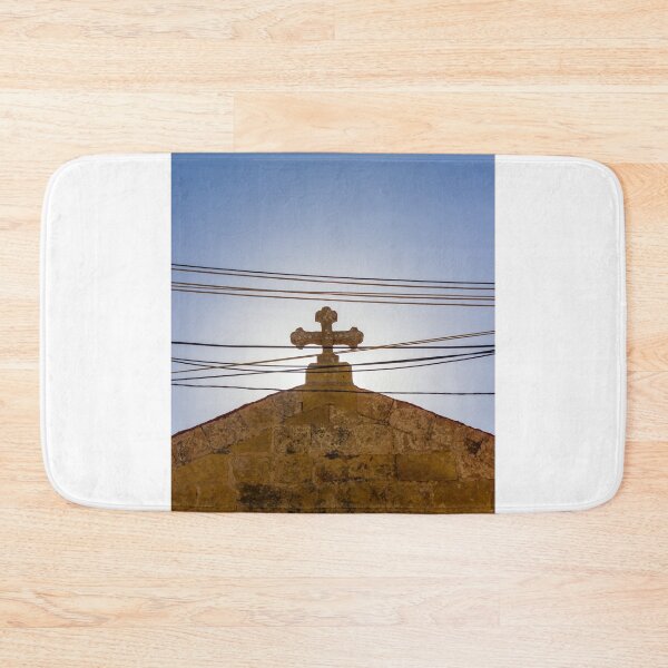 Item preview, Cross On Stone Church Roof Under Clear Blue Sky With Power Lines and Sunlight designed and sold by Nmallia.