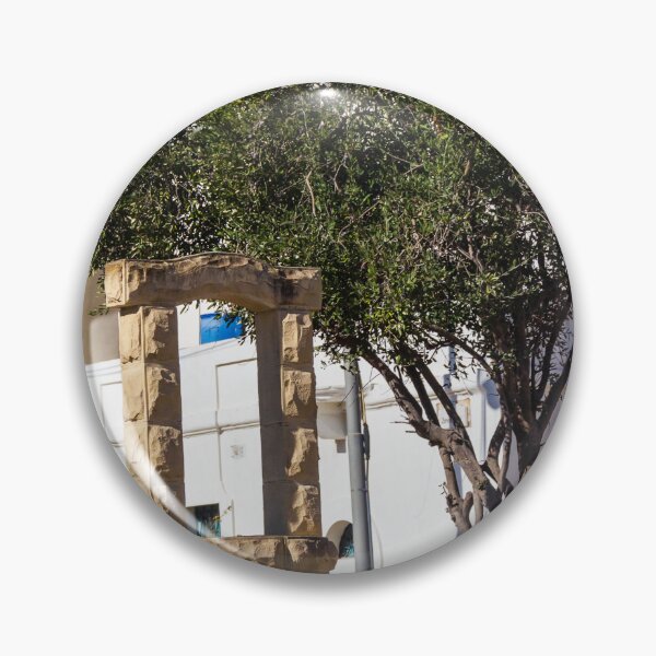 Item preview, Sunlit Stone Archway Garden With Olive Tree, White Mediterranean Buildings And Blue Shutters designed and sold by Nmallia.