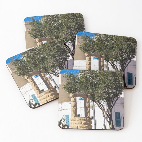 Item preview, Sunlit Stone Archway Garden With Olive Tree, White Mediterranean Buildings And Blue Shutters designed and sold by Nmallia.
