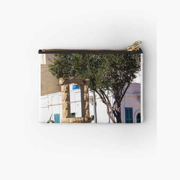 Item preview, Sunlit Stone Archway Garden With Olive Tree, White Mediterranean Buildings And Blue Shutters designed and sold by Nmallia.