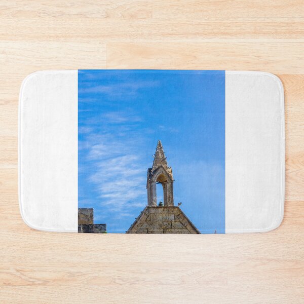 Item preview, Gothic Stone Church Facade With Blue Sky and Historic Architecture in Bright Day designed and sold by Nmallia.