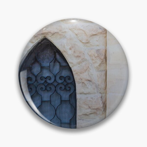 Item preview, Rustic Stone Wall With Arched Window And Decorative Iron Bars On Exterior Building designed and sold by Nmallia.