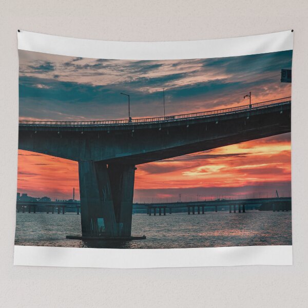 Item preview, Dramatic Crimson Sunset Below Concrete Bridge designed and sold by Nightwindow.