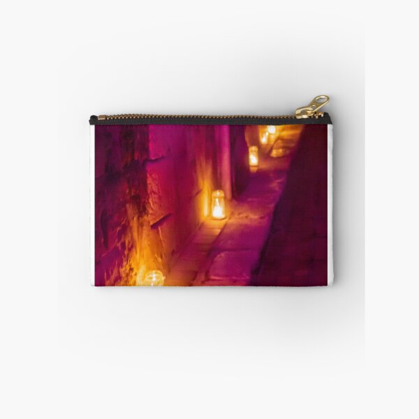 Item preview, Candlelit Alley At Night With Purple And Orange Hue, Warm Lanterns Along Stone Wall Glow designed and sold by Nmallia.