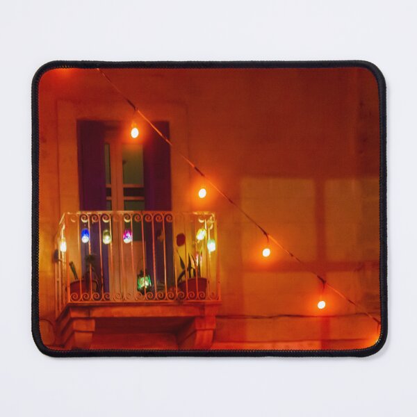 Item preview, Warm Night Balcony With String Lights and Colorful Bulbs Over Stone Building designed and sold by Nmallia.