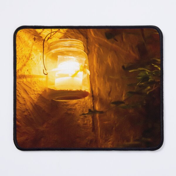 Item preview, Cozy Amber Lantern Hanging on Stone Wall Lighting a Warm Outdoor Night Scene designed and sold by Nmallia.