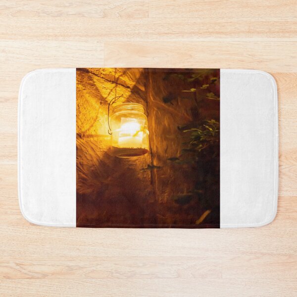 Item preview, Cozy Amber Lantern Hanging on Stone Wall Lighting a Warm Outdoor Night Scene designed and sold by Nmallia.