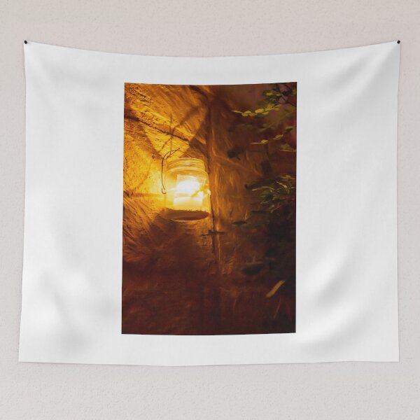 Item preview, Cozy Amber Lantern Hanging on Stone Wall Lighting a Warm Outdoor Night Scene designed and sold by Nmallia.