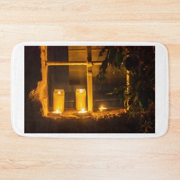 Item preview, Warm Candlelight In Glass Jars On Stone Ledge By Window At Night Creating Cozy Evening Mood designed and sold by Nmallia.