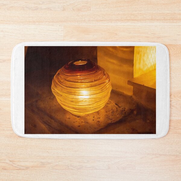 Item preview, Warm Amber Lantern Sits on Sandy Ground Providing Cozy Indoor-Outdoor Glow and Decor designed and sold by Nmallia.