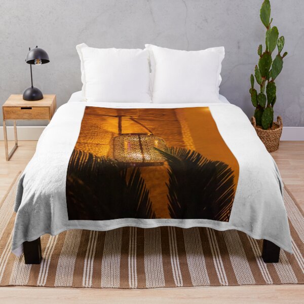 Item preview, Warm Moroccan Lantern Glow Illuminates Cozy Indoor Setting With Stone Wall and Palm Leaves designed and sold by Nmallia.