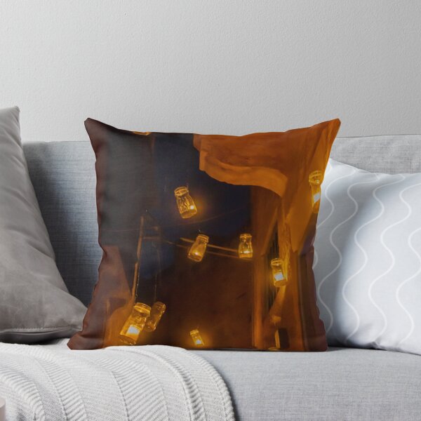 Item preview, Warm Amber Jar Lanterns Dangling Over Narrow Night Alley Creating Cozy Street Scene Atmosphere Warmth designed and sold by Nmallia.