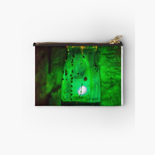 Item preview, Green Glowing Bottle With Cracked Surface in Dark Setting for Mystery and Halloween designed and sold by Nmallia.