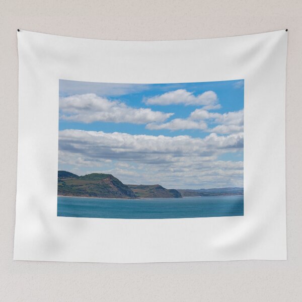 Aperçu de l'œuvre Nuages cumulus et stratocumulus au-dessus de la côte jurassique et de la baie de Lyme, dans le Dorset. créée et vendue par Dorset Girl.