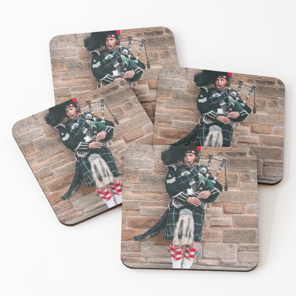 Item preview, Traditional Scottish bagpiper playing in full Highland dress on the Royal Mile designed and sold by Creative photos and art.